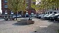 Mejlborg Torvet, a small cobbled square including the bronze fountain of Ålefangeren (The Eel-catcher).