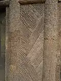 An element of a pheasant house inlaid with bark in the Sofiyivka Park