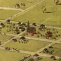 An aerial view of the First Catholic Church in Lansing, as "15. Catholic Church" in Albert Ruger's Bird's Eye View of Lansing (1866), (cf. [1]). This was drawn prior to the three additions, the spire, and construction of the parsonage and parochial school. This also shows the original apse at the back of the church where later additions would be made.