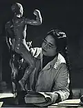 Student of BCCM learns acupuncture points. March 1963, People's Pictorial.