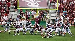 Matt Szymanski kicking an extra point at the 2006 Texas A&M vs. The Citadel college football game