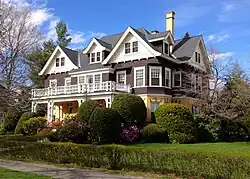 225 Elm Street, Northampton, MA. Built 1907. Queen Anne yellow brick and brown shingle.