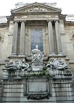 The massive Fontaine des Quatre-Saisons on the rue de Grenelle (7th arr.) (1739), by sculptor Edme Bouchardon, had a crowd of monumental statues but only two faucets, and irritated the philosopher Voltaire because of its large scale on the narrow street.