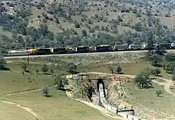A Santa Fe train crosses over itself at the Tehachapi Loop
