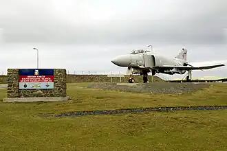 A Phantom aircraft as the gate guardian at the entrance to the air terminal at Mount Pleasant Complex in the Falkland Islands. This was removed c. 2011