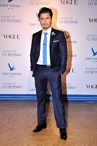 Photograph of person posing for photo
