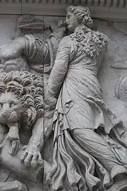 Ceto, robed and with long hair, on a frieze