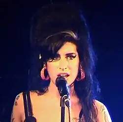 Image 37Amy Winehouse was a singer-songwriter from Southgate, north London. (from Culture of London)
