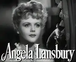 A young white women facing forward, with the name "Angela Lansbury" superimposed in front of her