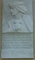Opryshok Vasyl Bayurak holding bartka