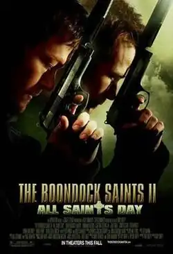 Two men have pistols raised upwards in front of their faces.