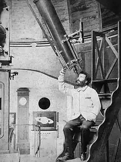 Camille Flammarion at the eyepiece of his 9½-inch Bardou refractor at his Juvisy observatory