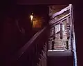 Ground floor exterior stairwell at Carl Street Studios. The hand-carved balusters and railings were executed by Torres and Edgar Miller.