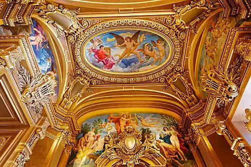 Ceiling of the octagonal salon at the eastern end with Jules-Élie Delaunay's central oval panel, The Zodiac, and over-door panel, Apollo Receiving the Lyre[41]