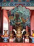 An altar with idol and offerings