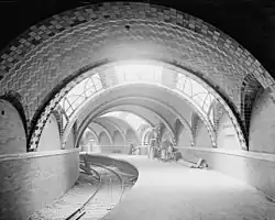 Black-and-white view of the incomplete station, seen from the platform in the early 1900s