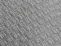 Closeup of gold weave pattern on an OTM blank white gi.