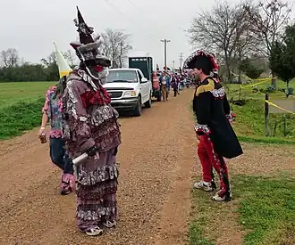 Capitane and a courir disguised as a rougarou