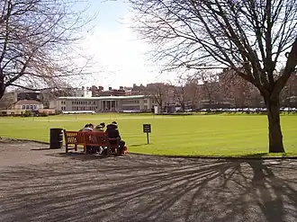 Colour photo showing a cricket ground