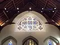 Window above the entrance at the rear of the chapel