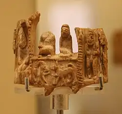 Naqada IId carving, with dynastic rulers and animals, and kneeling soldiers on the reverse.[50][51]