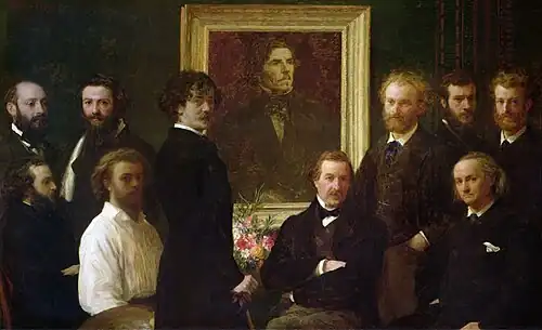 Homage to Delacroix by Henri Fantin-Latour, showing Balleroy in the foreground (no, in the background on the right, behind Charles Baudelaire)