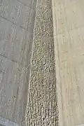 Closeup of corrugated pattern used for béton brut on the Swisscom-Sendeturm St. Chrischona television tower (1984) in Switzerland