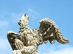 The sculpture of the eagle with flowing water