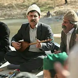 Musician and luthier Ghobad Ghobadi (تنبورقبادی), a face of Yarsanism plays a tanbur. Ghobadi makes tanburs in the Yarsan tradition.[4]