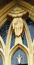 The carving “The Hand of God” by Alan Collins