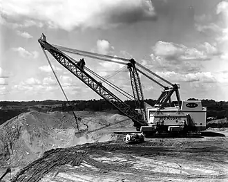 Big Muskie was built in 1969 as the world's largest ever dragline excavator, being 487 ft (148 m) in length, weighing 13,500 short tons (12,247 t), and hoisting a 220 cu yd (168.2 m3) bucket that could move 325 short tons (295 t) of material at a pass. Its top speed was 0.1 miles per hour (0.16 km/h).