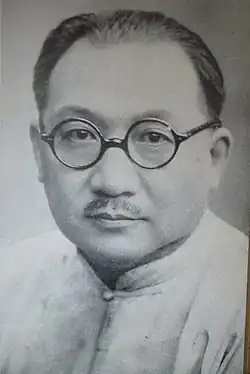 Chinese man wearing a tangzhuang