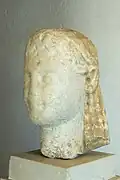 Eroded head of a Kouros, marble, 550 BC