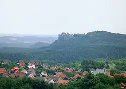View from the Ziegenberg with the village of Heimburg in the foreground to the ruins of Regenstein Castle on the northwestern spur of the Regenstein