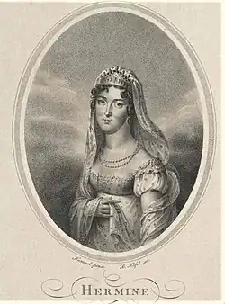 Black and white portrait of a young woman in a dotted, white empire dress, wearing a coronet and veil on her dark, curly hair. In her neck are pearls. The picture bears the inscription "Hermine".
