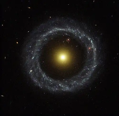 The yellow nucleus of Hoag's Object surrounded by a blue ring of stars