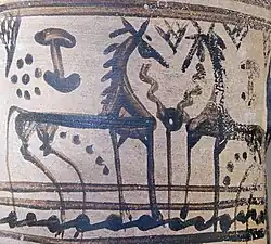 Vessel decorated with simple geometric drawings of horses.