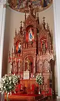 Estácio Zambelli: statue at the main altar of the Church of Our Lady of Lourdes, Caxias do Sul.