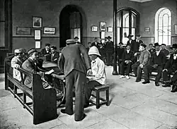 "In the Main Hall of the Strangers' Home, West India Dock", Living London, c. 1902[11]