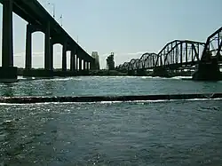 International Bridge (left) and rail bridge (right) with the remedial berm in the foreground