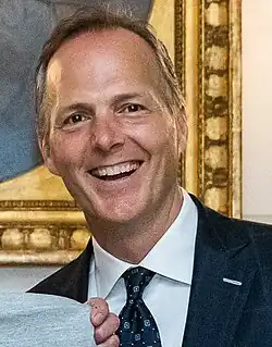 Jon Cooper, head coach of the Tampa Bay Lightning (BBA '89)[61]