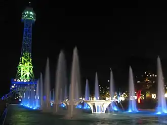 Kings Island's Eiffel Tower at night, before the 2019 International Street redesign.