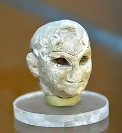 Head of a Sumerian male worshipper from Tell Asmar (Eshnunna), Iraq, on display at the Sulaymaniyah Museum, Iraq since 1961. The Lost Treasures from Iraq designates it as "status unknown".[29]