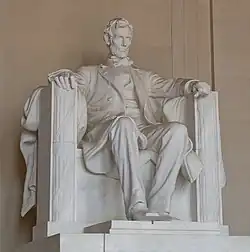 Marble statue of a seated man
