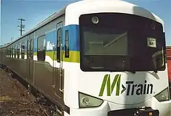 M>train liveried Siemens carriage