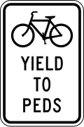 R9-6 Bicycles yield to pedestrians