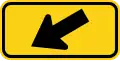 W16-7PL Downward diagonal arrow to the left (plaque)[e]