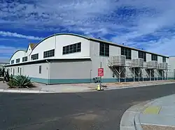 Demountable Hangar, located at the North Apron, Mesa Gateway Airport (formerly Williams AFB). Built in 1942 and designed by the Del E. Webb Construction Company to resemble an enlisted aviator badge of the Army Air Force. Listed on the National Register of Historic Places in 1995, ref. #95000743.