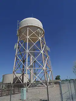 Water Tower at Williams Air Force Base (now Arizona State University at the Polytechnic campus). The water tower was constructed in the winter of 1941–1942 by the Del E. Webb Construction Company. It was part of the historical Williams Air Force Base on the land on which Mesa Gateway Airport and the Arizona State University at the Polytechnic campus are now located. Listed in the National Register of Historic Places – 1995. Reference 95000745.