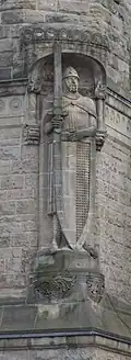 Knight Roland holding a shield with the blazon of Metz (a variation on a Roland statue).